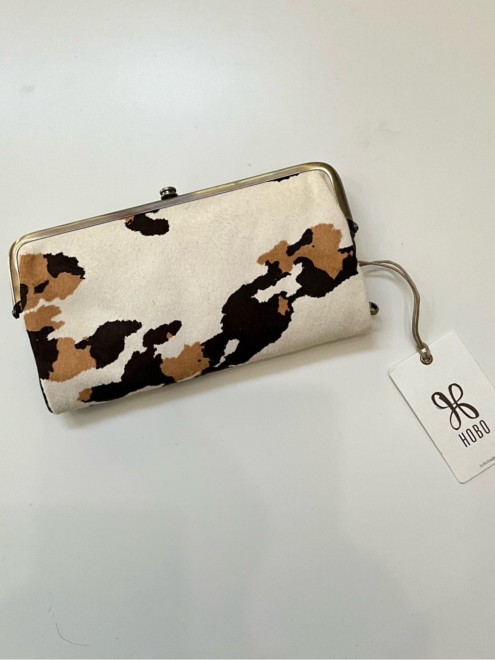 HOBO Lauren Cow Print Haircalf Leather Frame Kiss Lock Clutch Wallet NWT
